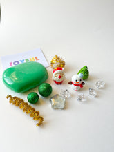 Load image into Gallery viewer, Green play dough with Christmas decorations on a white background
